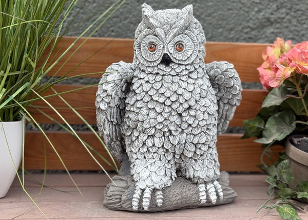 Steinfigur Kauz auf Ast